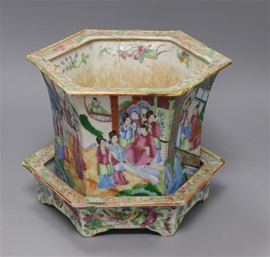 A Chinese famille rose jardiniere and stand (a.f.)